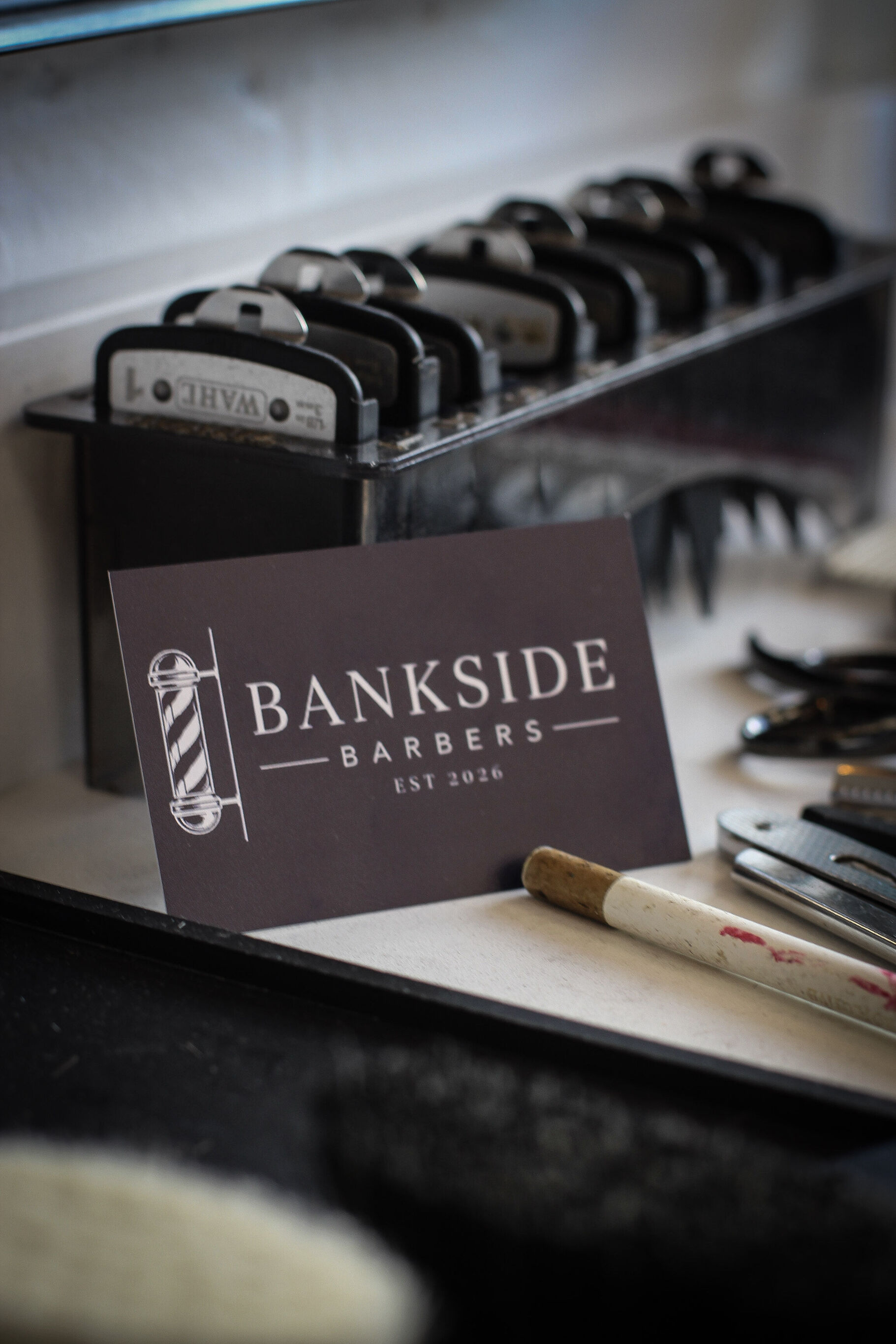 Clipper guards and a Bankside Barbers card on the station